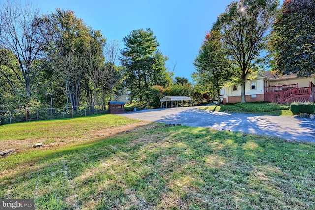 view of yard with a deck