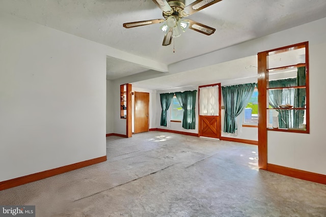 empty room featuring ceiling fan