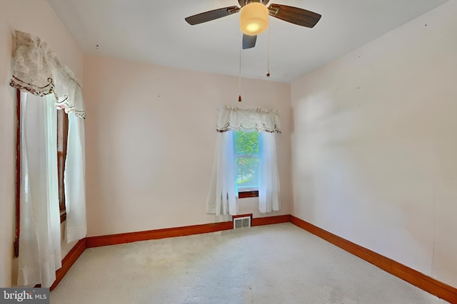 empty room with ceiling fan