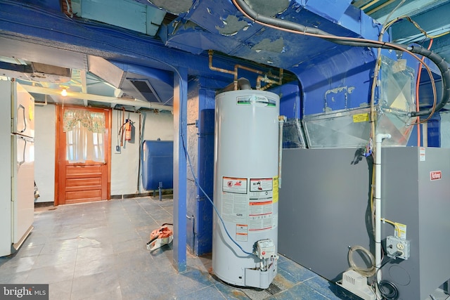 utility room featuring gas water heater