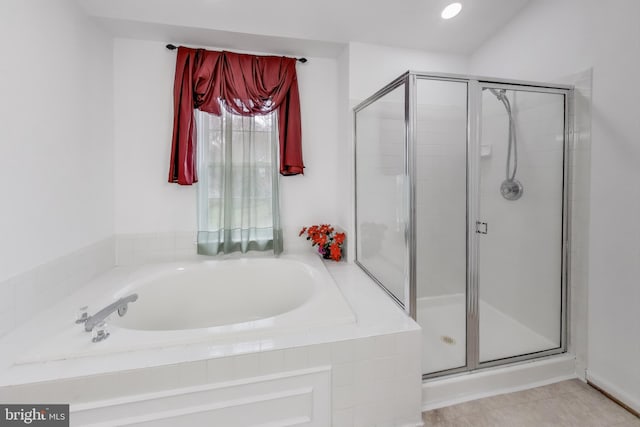 bathroom featuring tile patterned floors and plus walk in shower