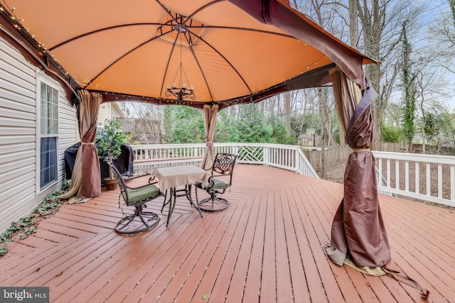 wooden deck featuring a gazebo