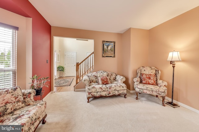 living area with carpet floors