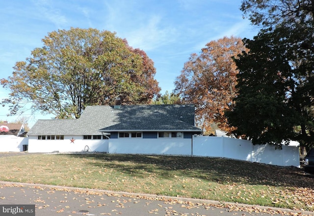 view of front of home with a front yard