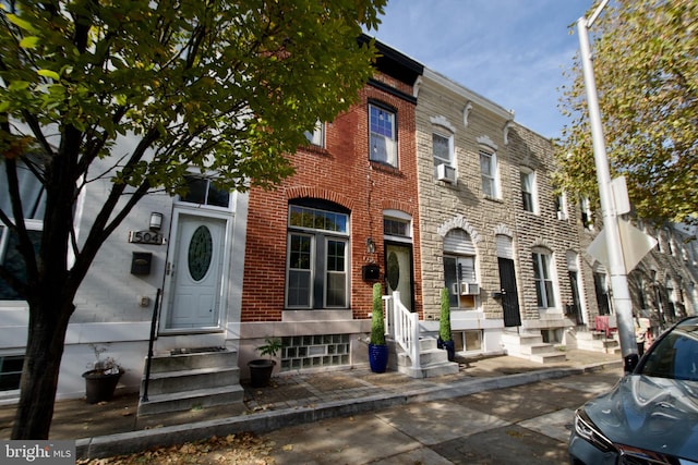 view of front of property with cooling unit