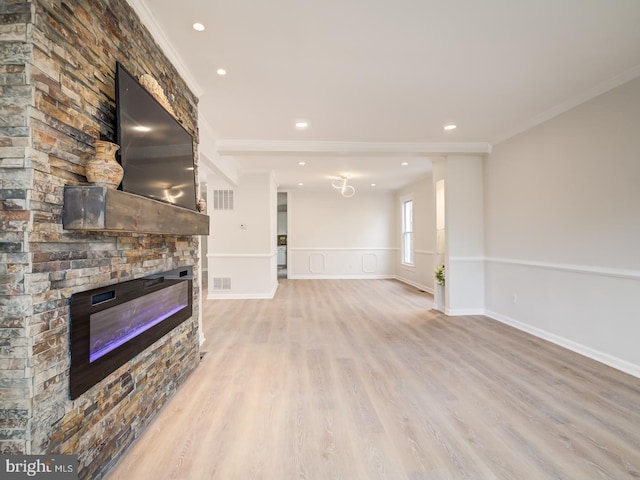 516 Harwood Ave, Baltimore, MD 21212 - unfurnished living room with crown molding, a fireplace, wood finished floors, recessed lighting, and wainscoting