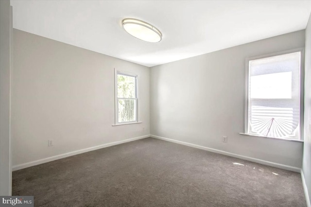 view of carpeted spare room