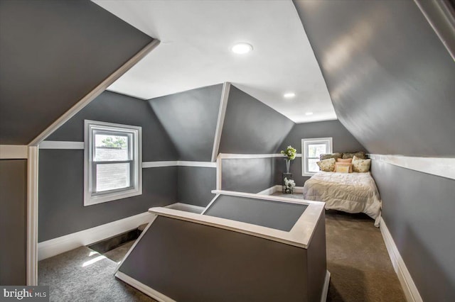 carpeted bedroom featuring vaulted ceiling