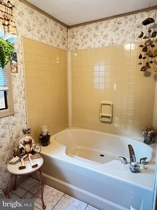 bathroom featuring washtub / shower combination and tile patterned floors