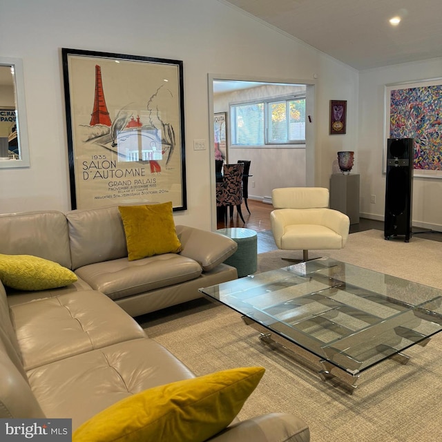 living room with vaulted ceiling and light carpet