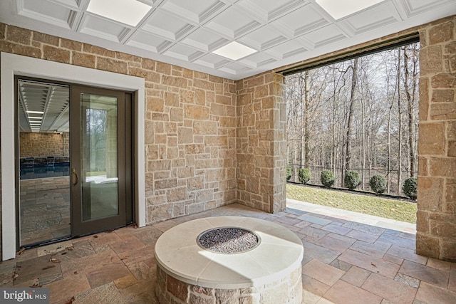 view of patio / terrace featuring an outdoor fire pit