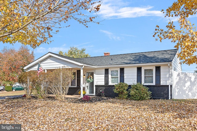 single story home featuring a porch