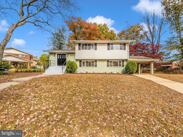 view of front of property with a carport