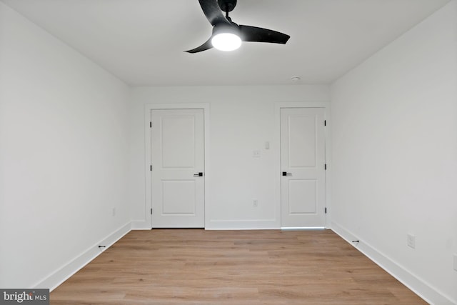 unfurnished room featuring light hardwood / wood-style flooring and ceiling fan