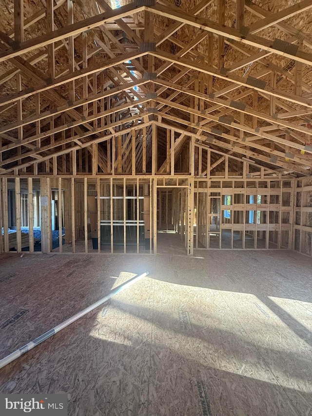 misc room with lofted ceiling