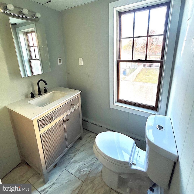 40 W Ridge St, Summit Hill, PA 18250 - bathroom featuring toilet, marble finish floor, and vanity