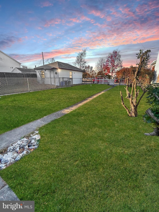 40 W Ridge St, Summit Hill, PA 18250 - yard at dusk featuring fence