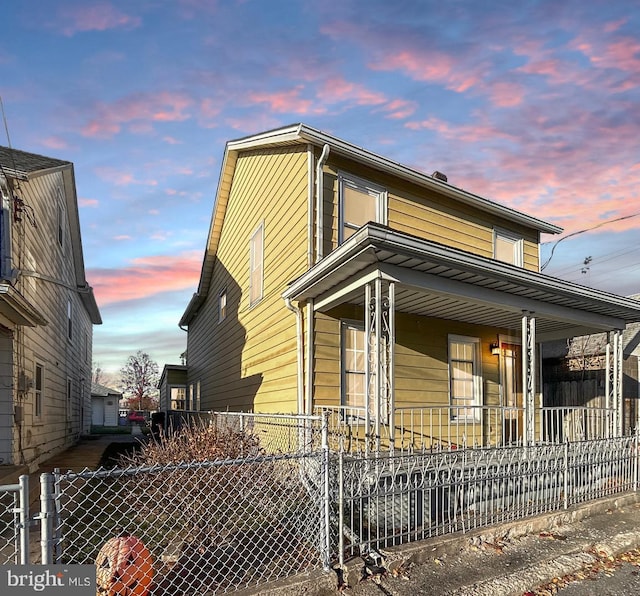 40 W Ridge St, Summit Hill, PA 18250 - view of side of property featuring a porch and fence