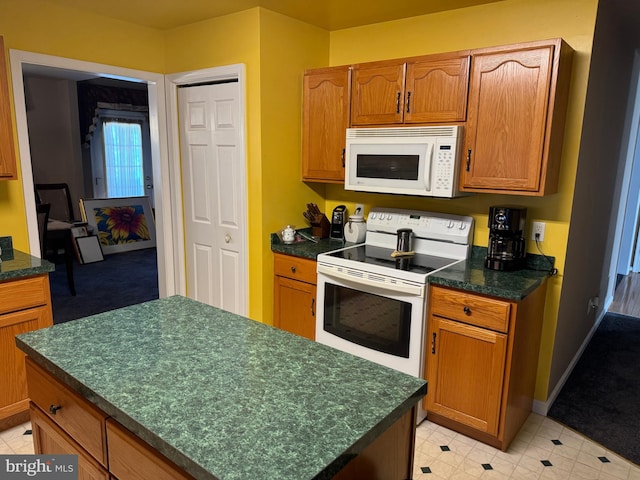 kitchen featuring white appliances