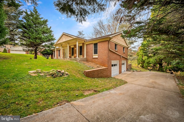 view of property exterior featuring a garage and a yard