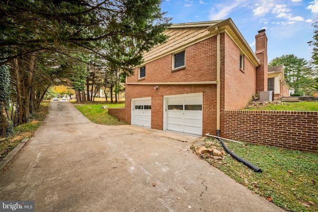 view of home's exterior with a garage