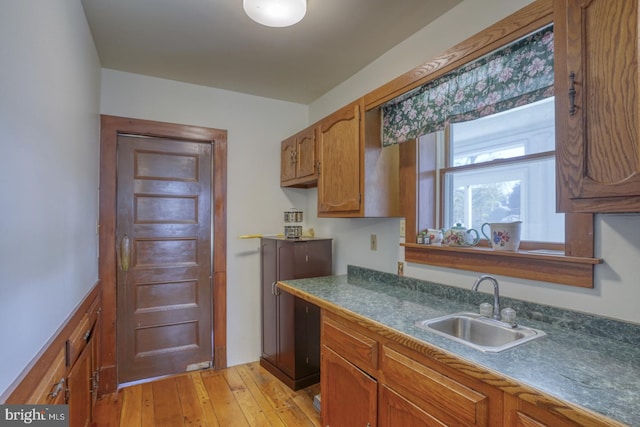 kitchen featuring light hardwood / wood-style floors and sink