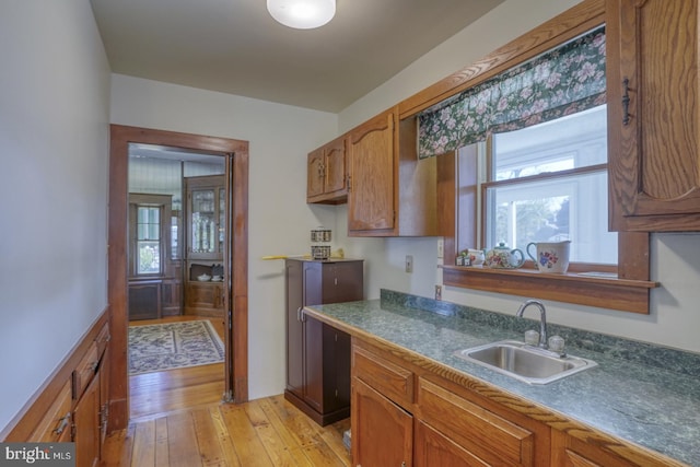 kitchen featuring light hardwood / wood-style floors and sink