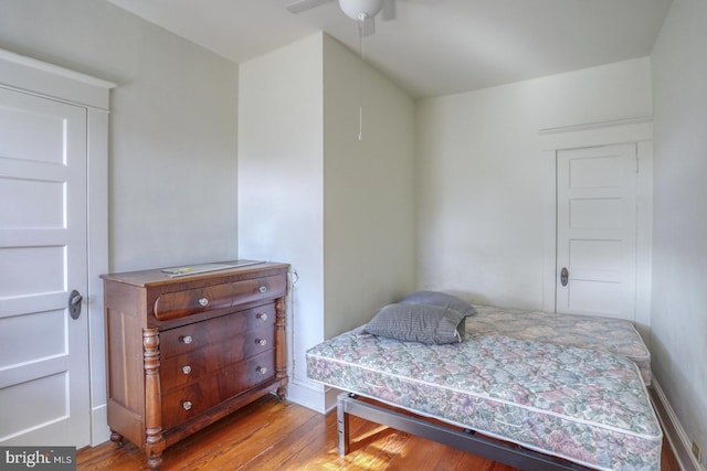 bedroom featuring ceiling fan and light hardwood / wood-style flooring