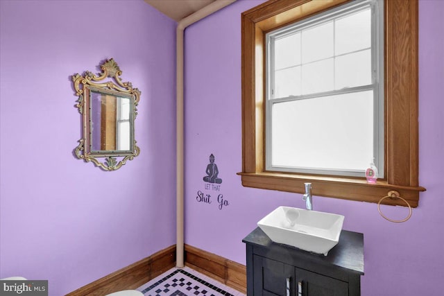 bathroom with vanity and plenty of natural light