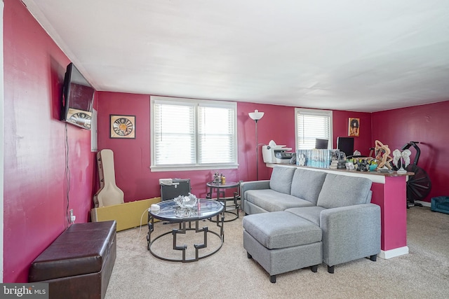 carpeted living room featuring a wealth of natural light