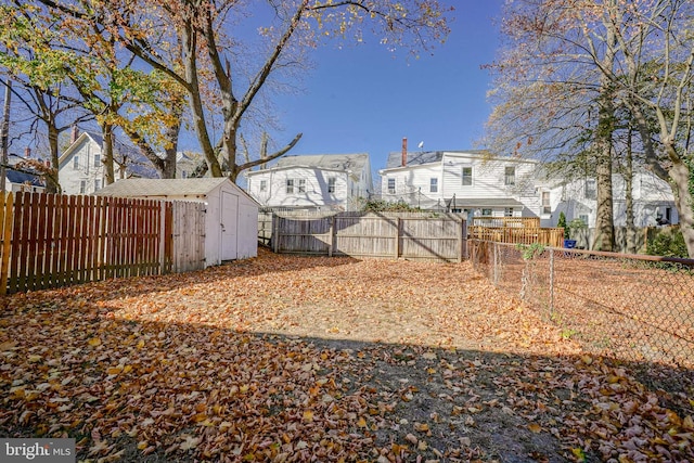 view of yard with a storage shed