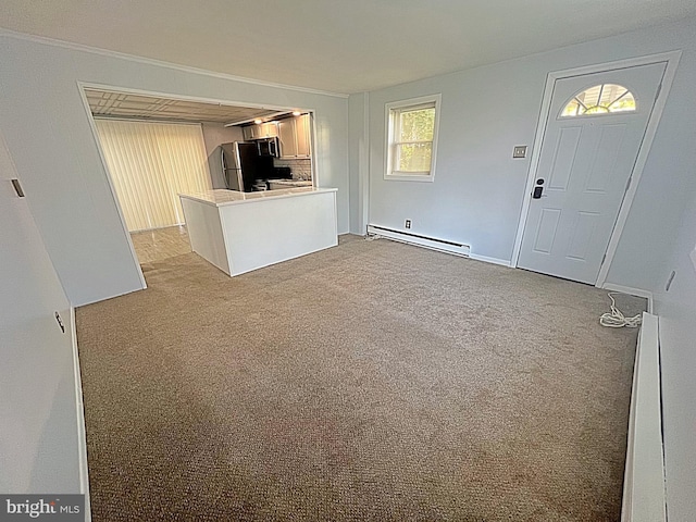 unfurnished living room featuring light carpet and a baseboard radiator