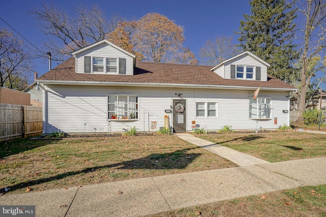 view of front of house with a front lawn