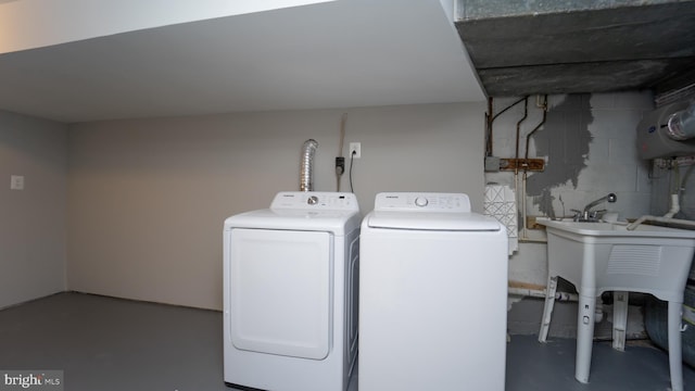 laundry area featuring washing machine and clothes dryer