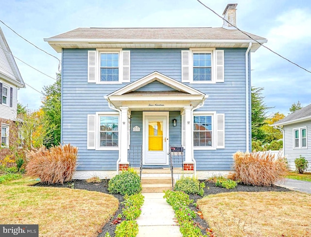 view of front of property with a front yard