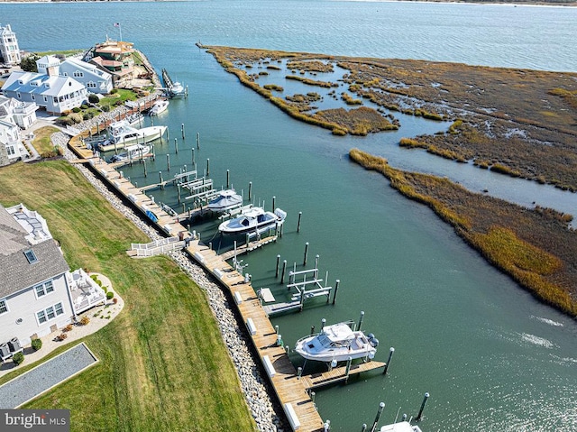 drone / aerial view featuring a water view