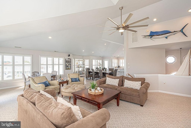 carpeted living room featuring lofted ceiling and ceiling fan