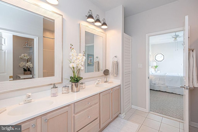 bathroom featuring vanity, ceiling fan, and tile patterned floors