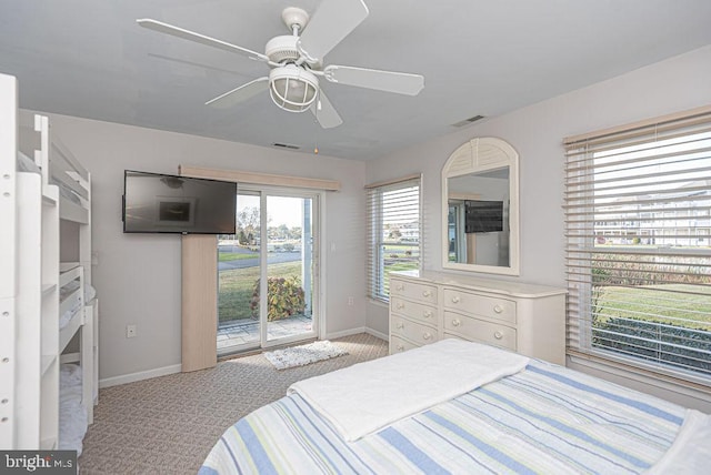 bedroom featuring access to outside, light colored carpet, and ceiling fan