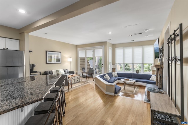 living room featuring light wood-type flooring