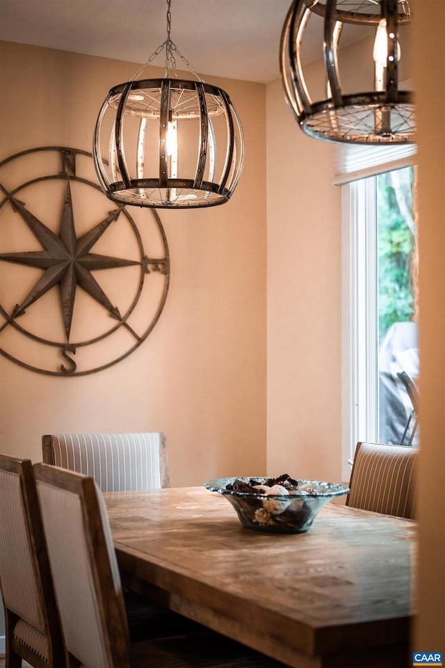 unfurnished dining area with an inviting chandelier