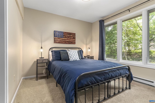 bedroom featuring carpet floors and baseboard heating