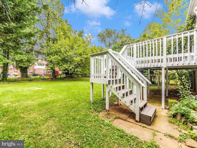 view of yard featuring a wooden deck