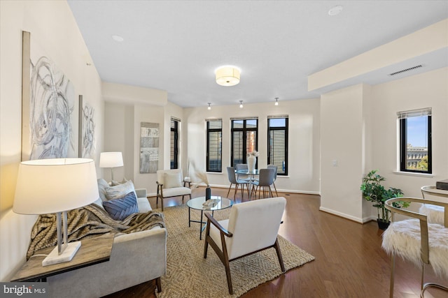 living room featuring dark hardwood / wood-style floors