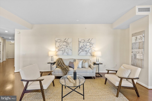 living room with hardwood / wood-style floors