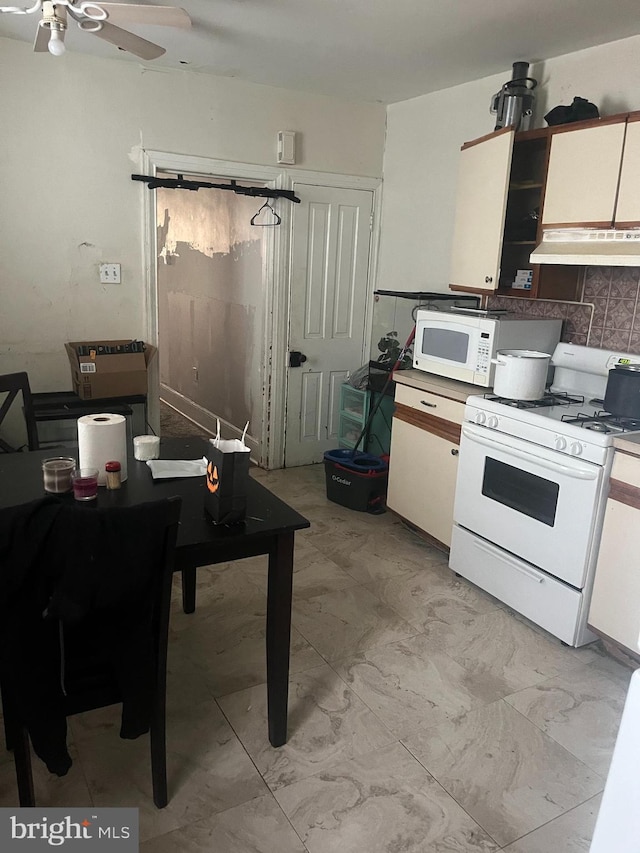 kitchen featuring white cabinets, white appliances, and ceiling fan