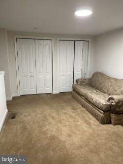 unfurnished living room with carpet floors