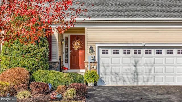 property entrance featuring a garage