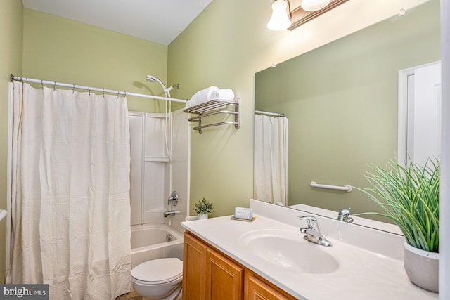 full bathroom with toilet, vanity, and shower / bath combination with curtain