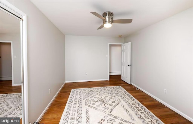 bedroom featuring hardwood / wood-style floors and ceiling fan